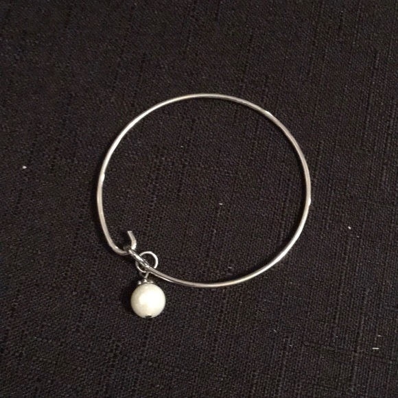 Swarovski Jewelry - A Swarovski pearl charm bangle bracelet Swarovski Jewelry - A Swarovski pearl charm bangle bracelet